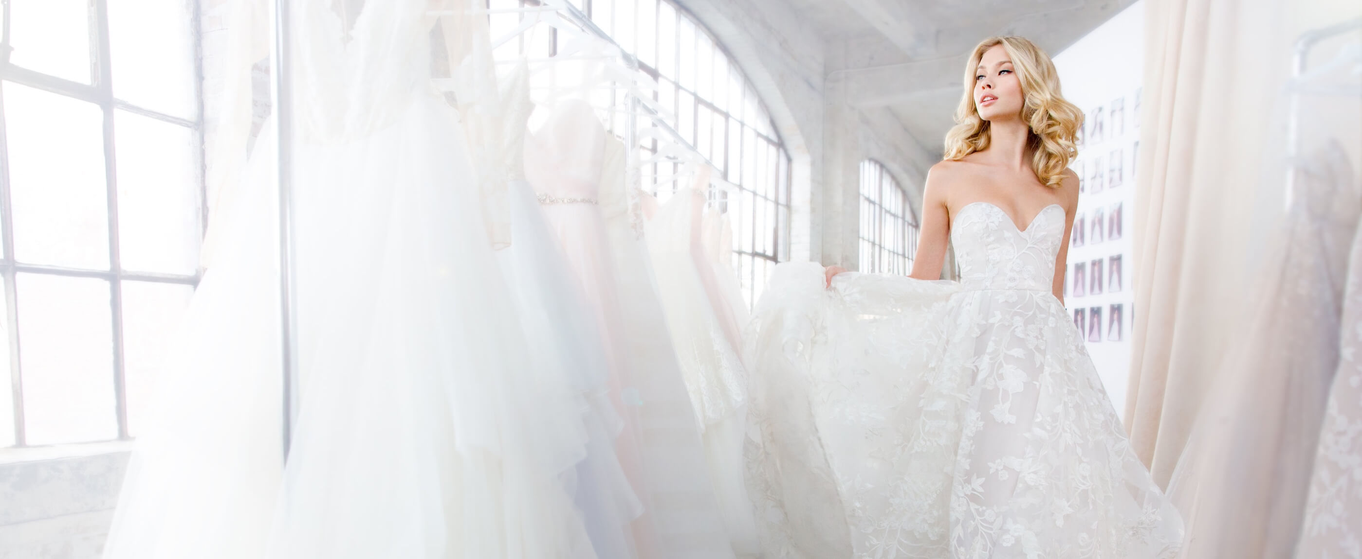 Model wearing a Le Jour Ball Gown