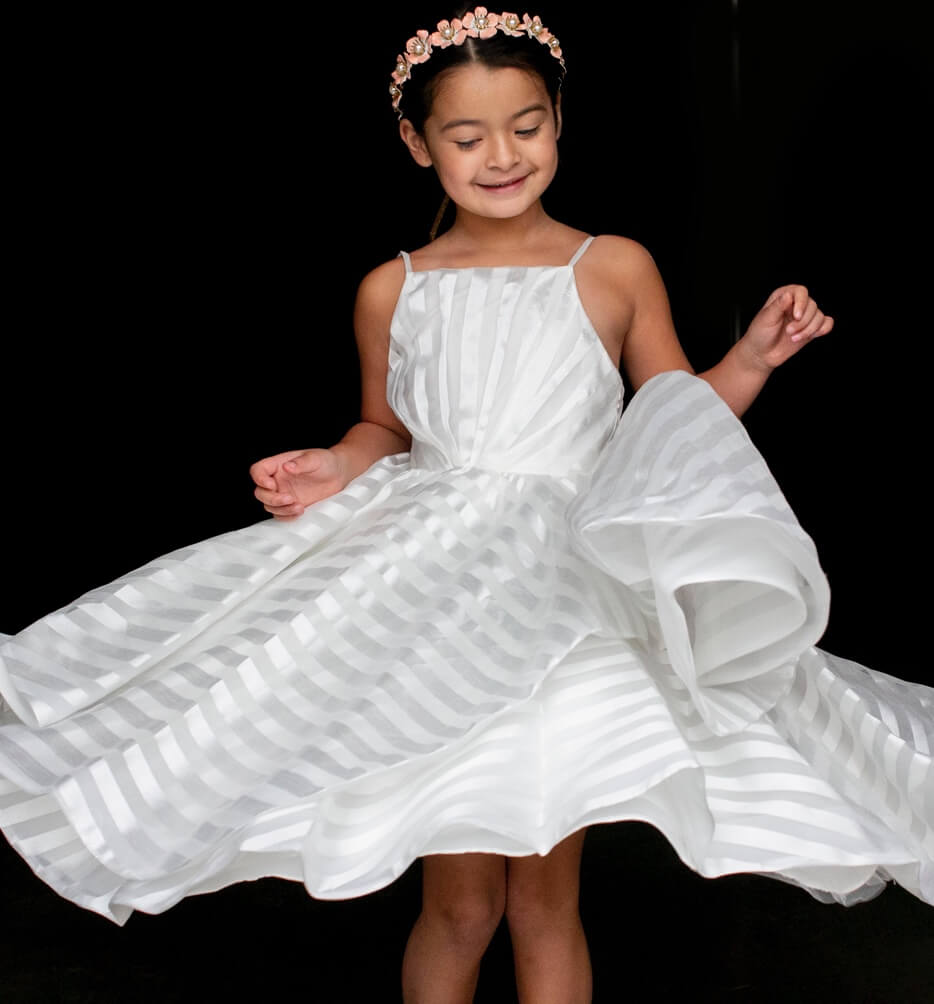 Flower girl in a white dress